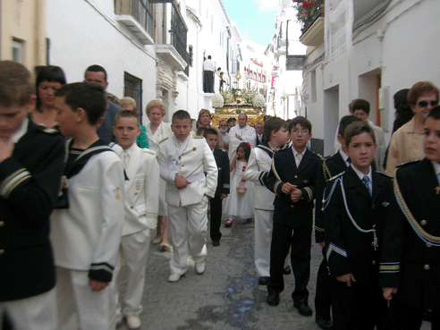 La procesion, en la calle Llana