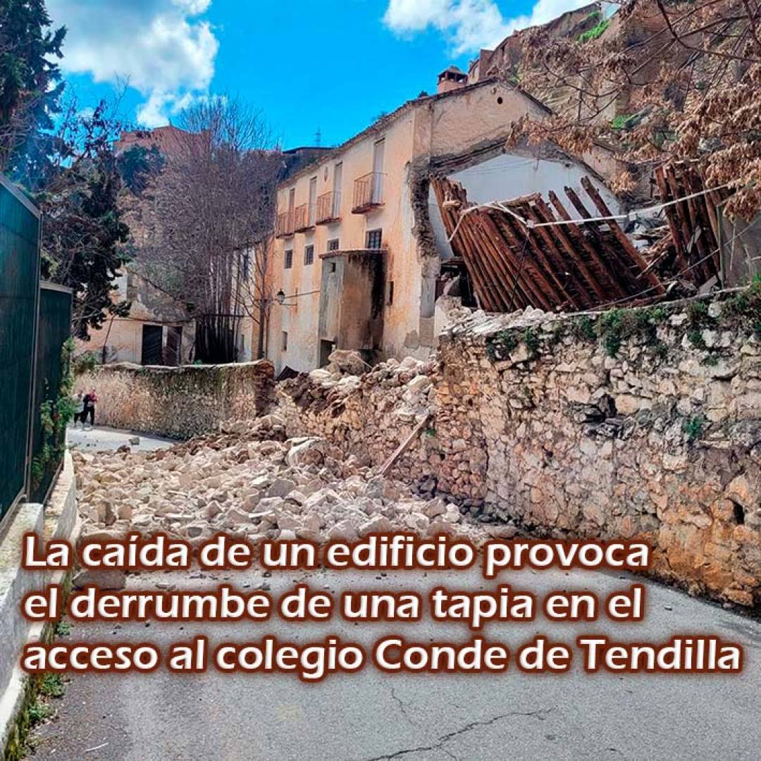 La caída de un edificio provoca el derrumbe de una tapia en el acceso al colegio Conde de Tendilla,  minutos después de finalizada la jornada escolar